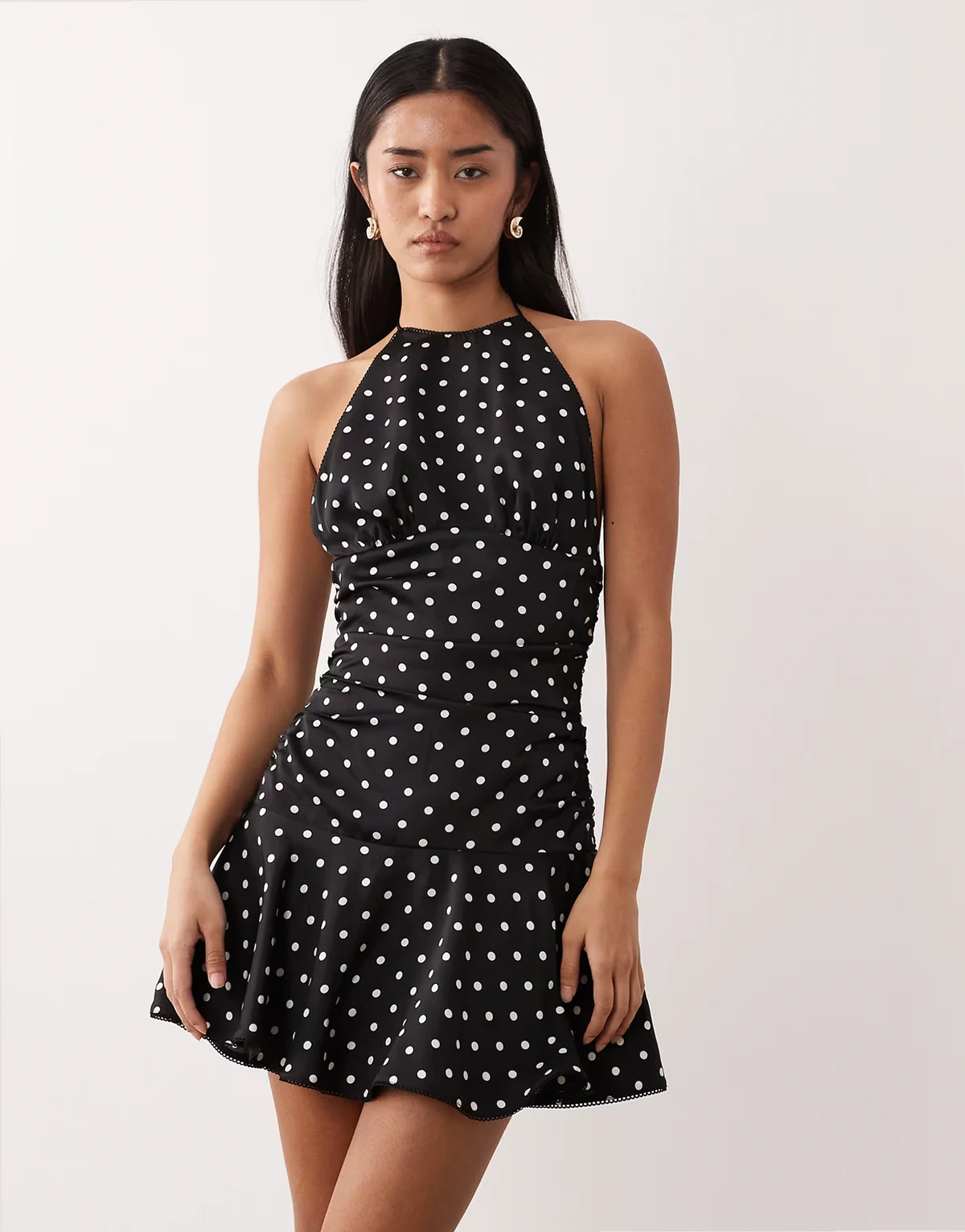 Cahuenga halter neck polka dot dress in black