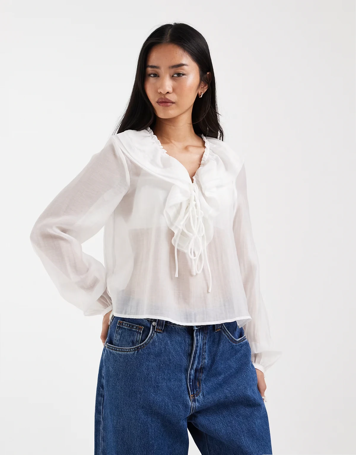tie front blouse with ruffle detail in white