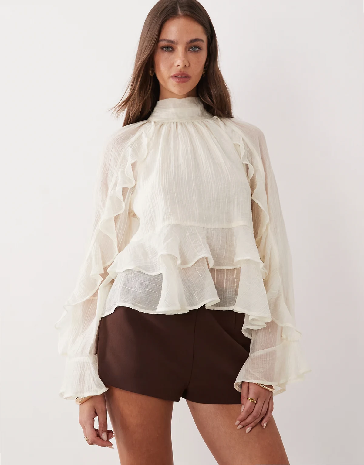 high neck long sleeve ruffle blouse in off white