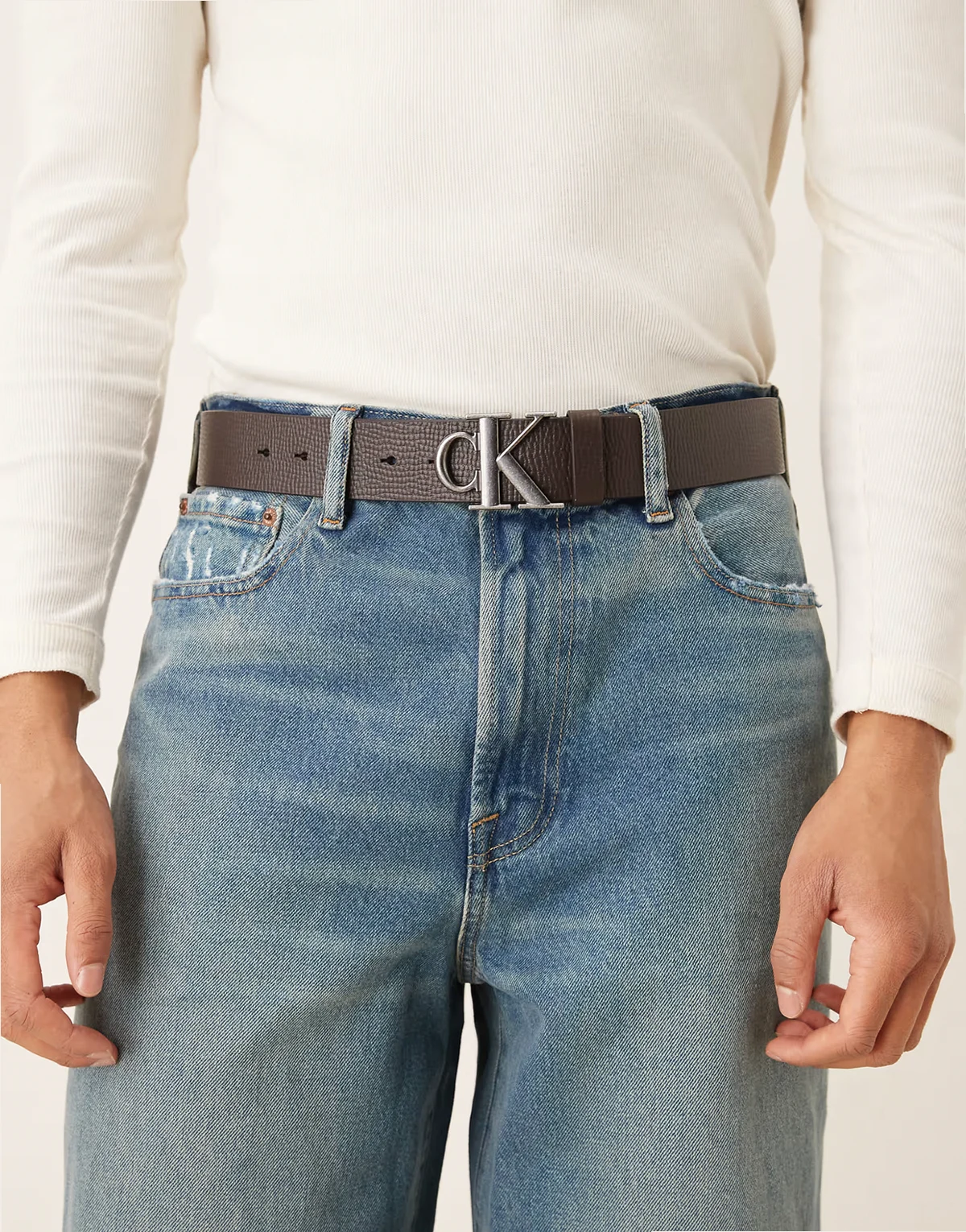 real leather belt with silver buckle in dark brown
