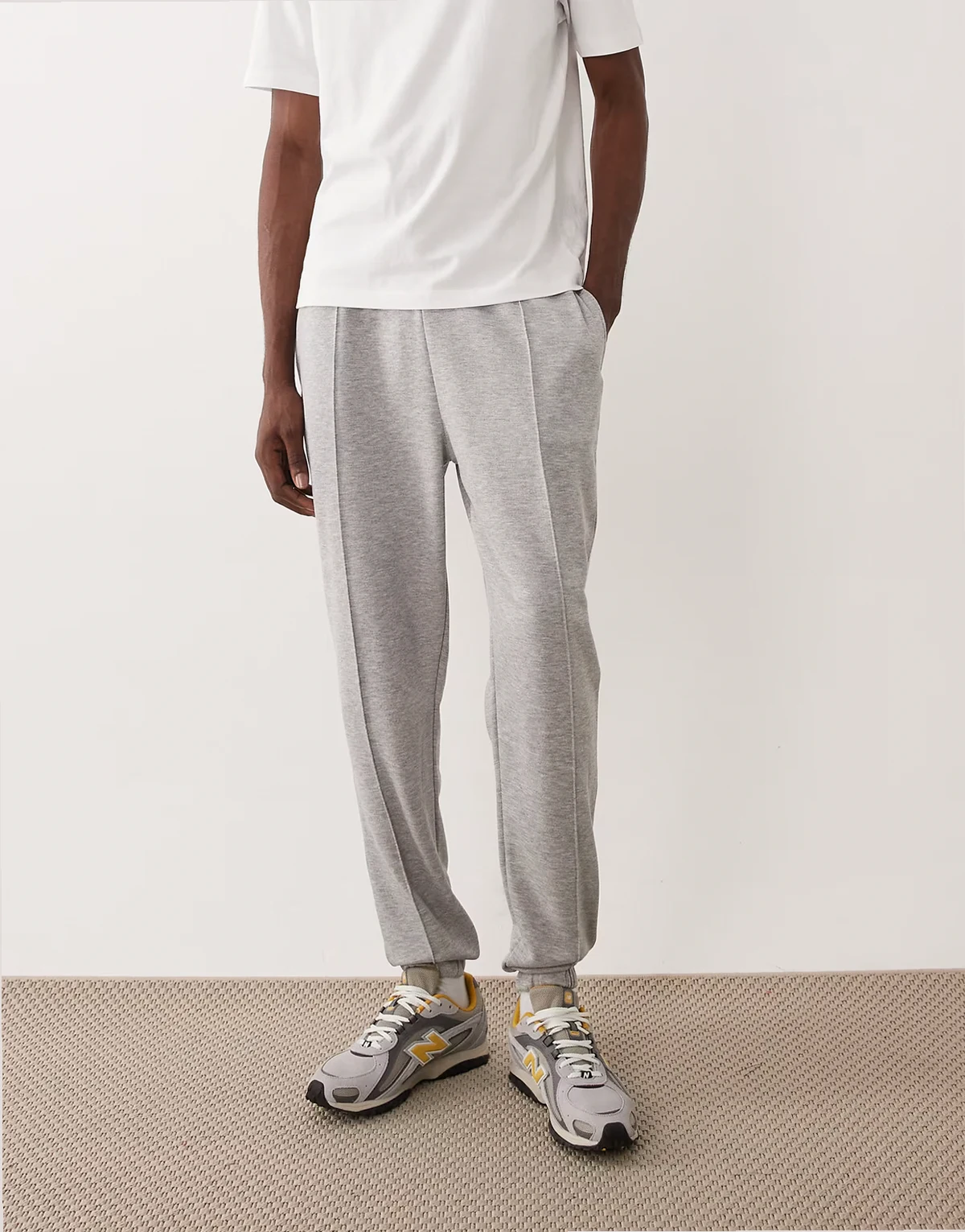 slim fit sweatpants with pintucks in light gray
