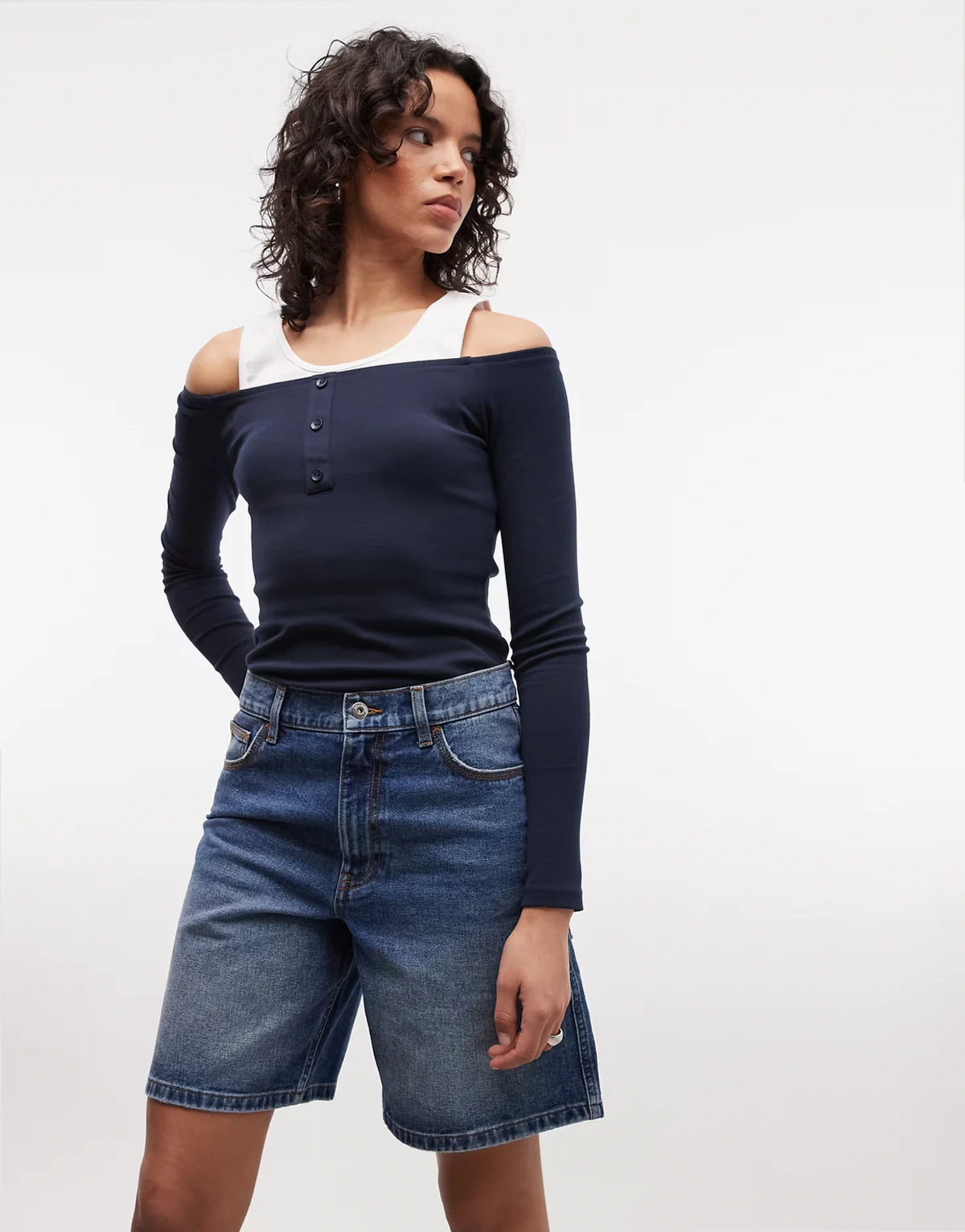 loose denim jorts in mid wash
