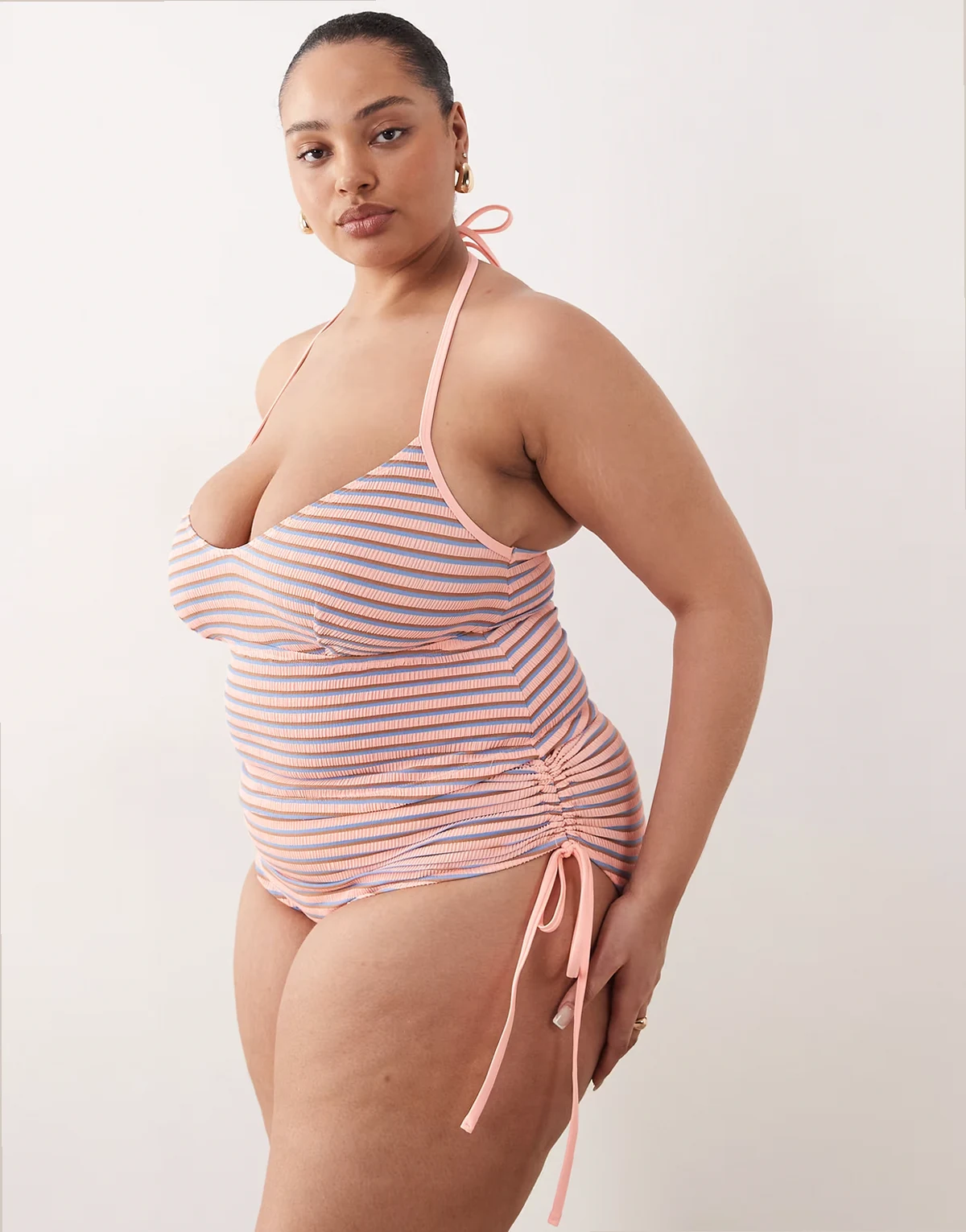 ASOS DESIGN Curve Sally high waist ruched side bikini bottoms in textured stripes