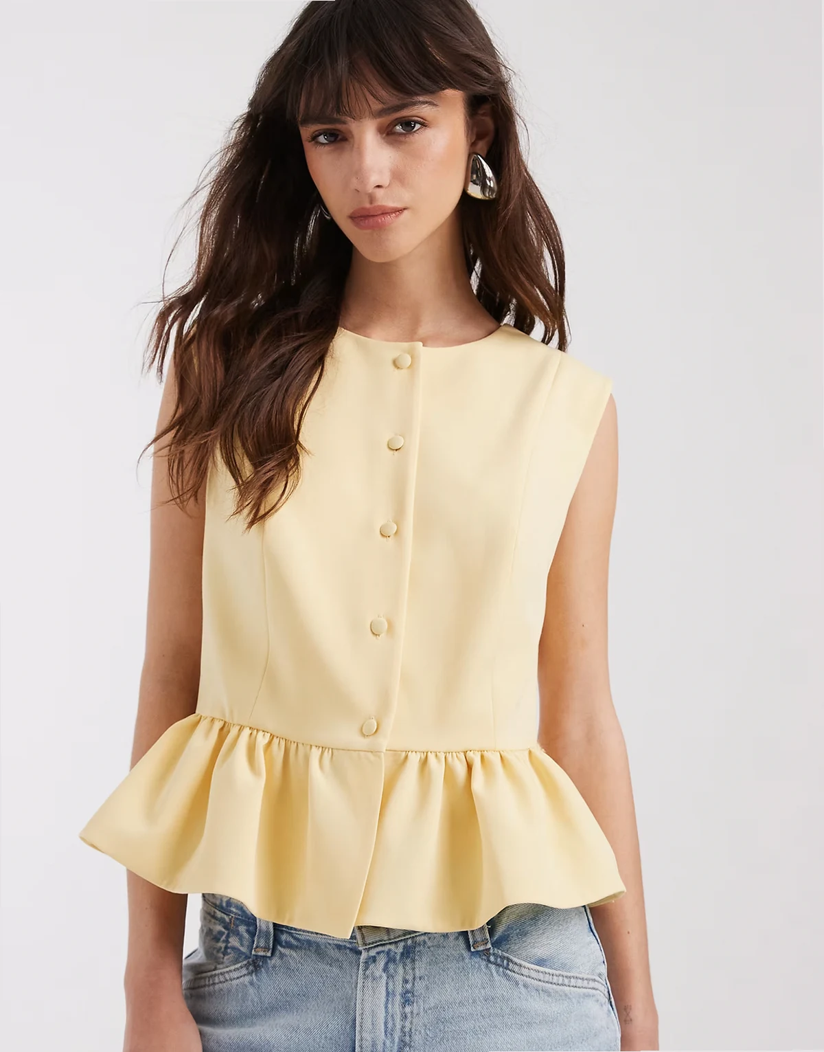 button down peplum tailored top in buttermilk