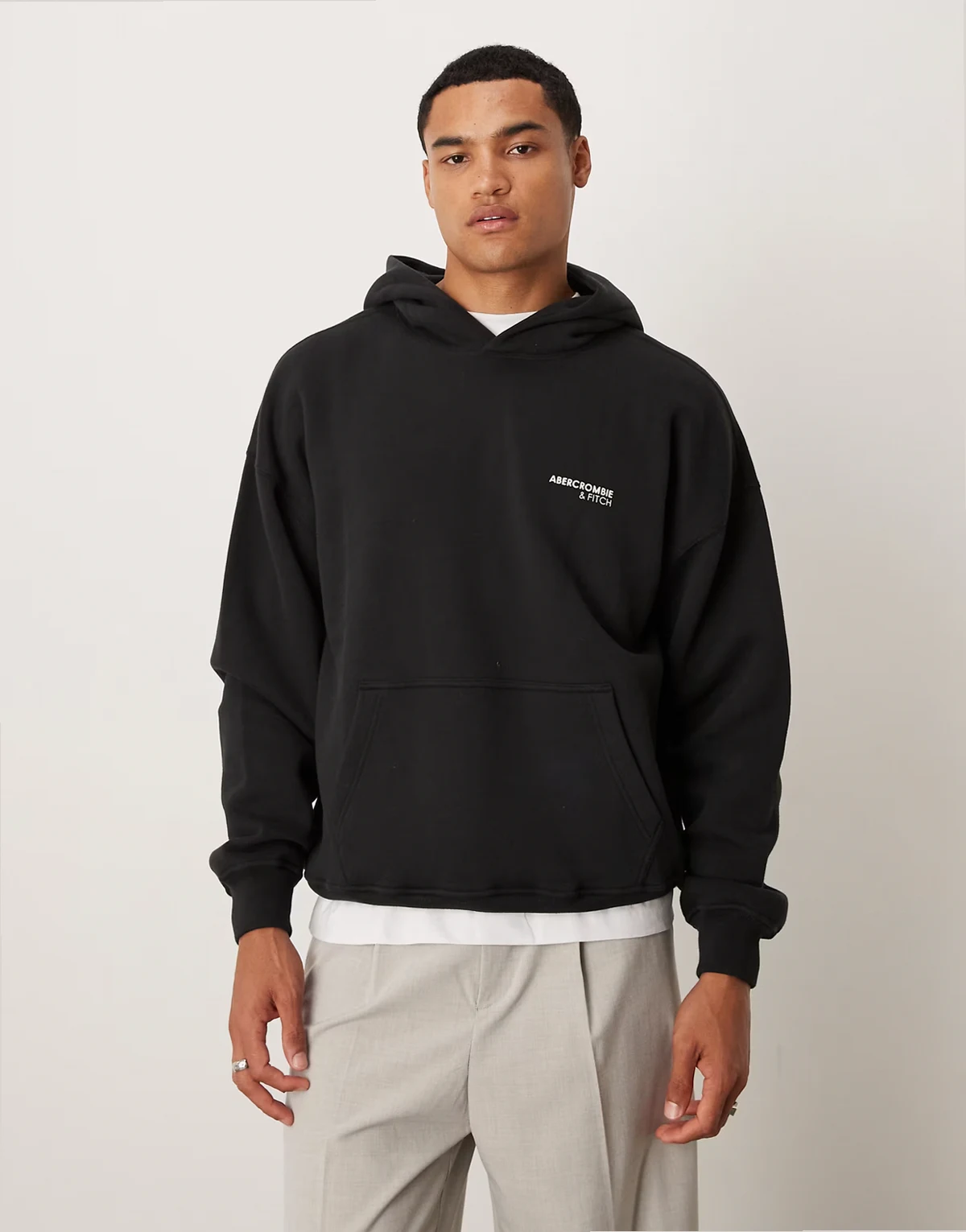 chest logo front pocket hoodie in black