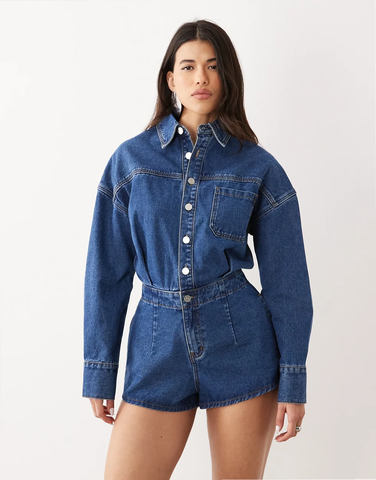 denim cinched waist romper in mid wash blue