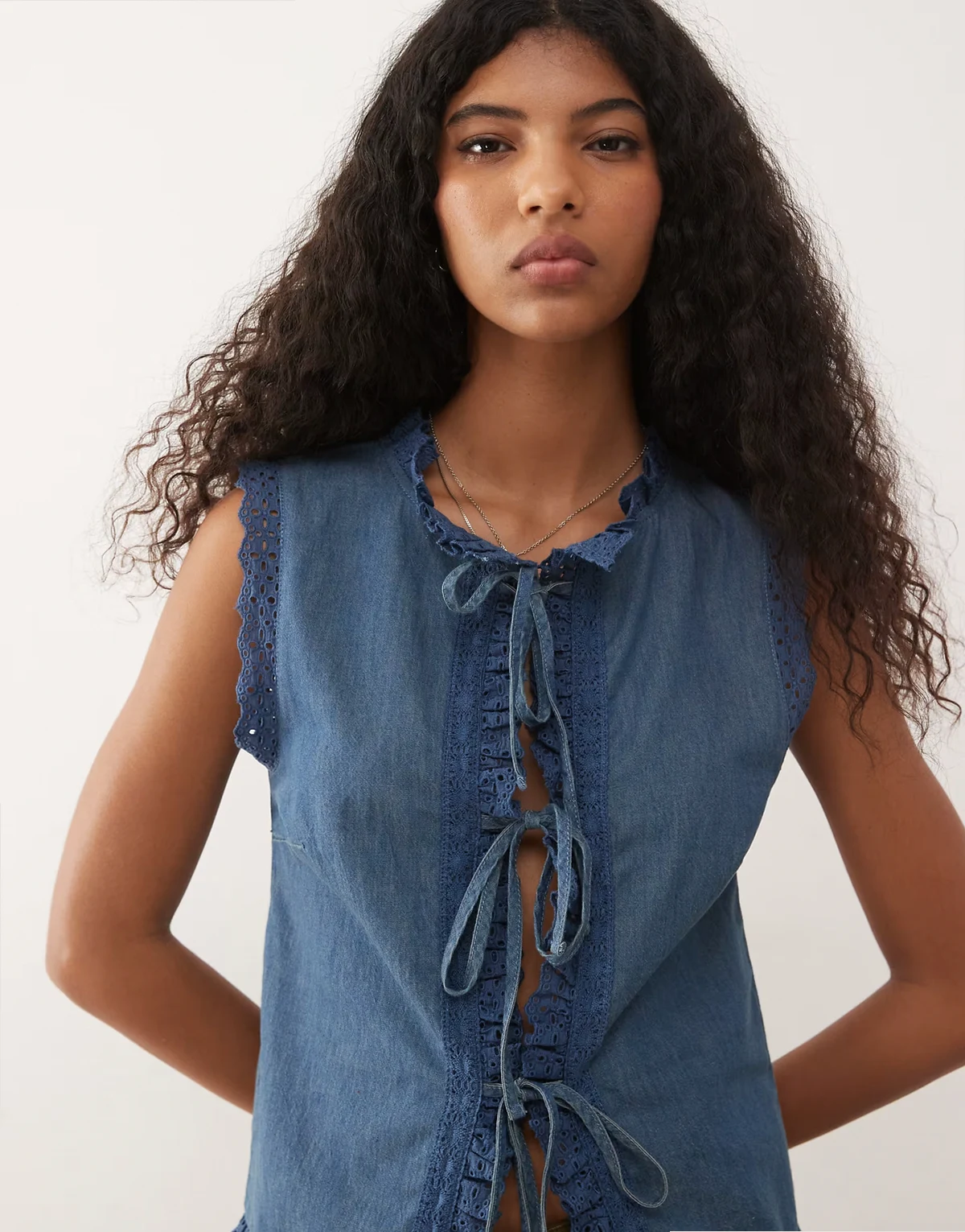 chambray denim tie front tank top with eyelet scallop details in blue