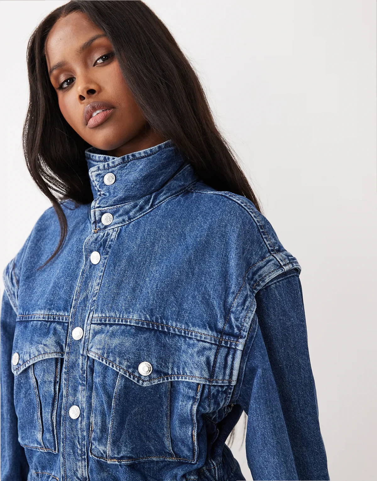 funnel neck denim jacket with cinched waist in midwash blue