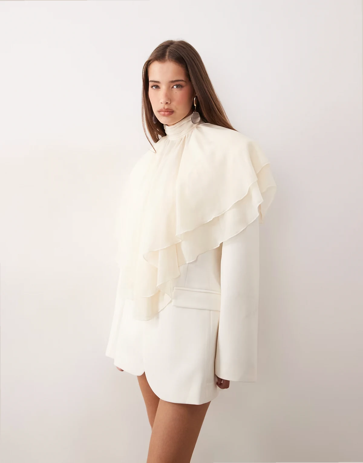 chiffon ruffle high neck poncho blouse in cream