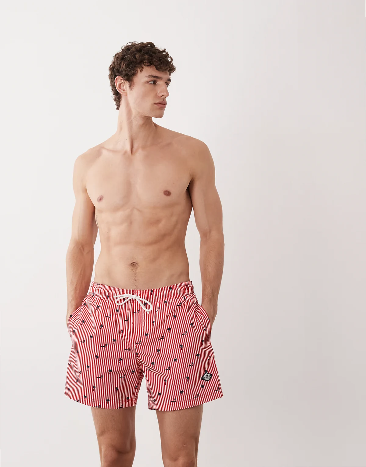 palm tree print swim shorts in red stripe