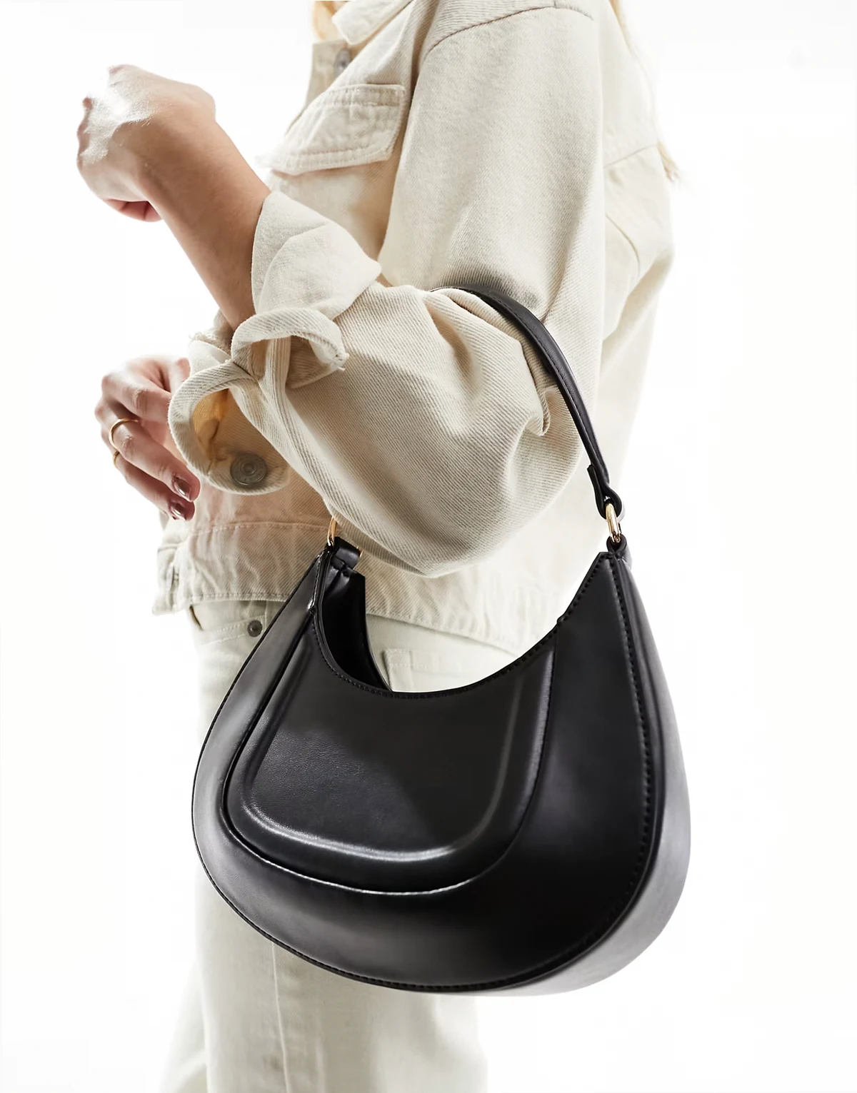 shoulder bag with debossed panelling in black