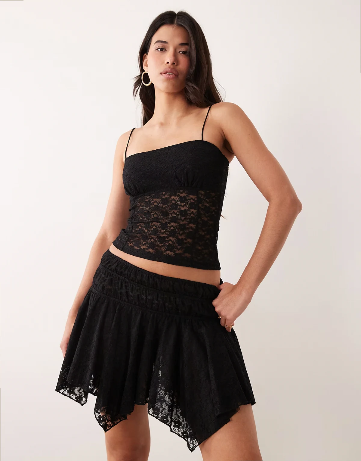 asymmetric lace layered mini skirt in black