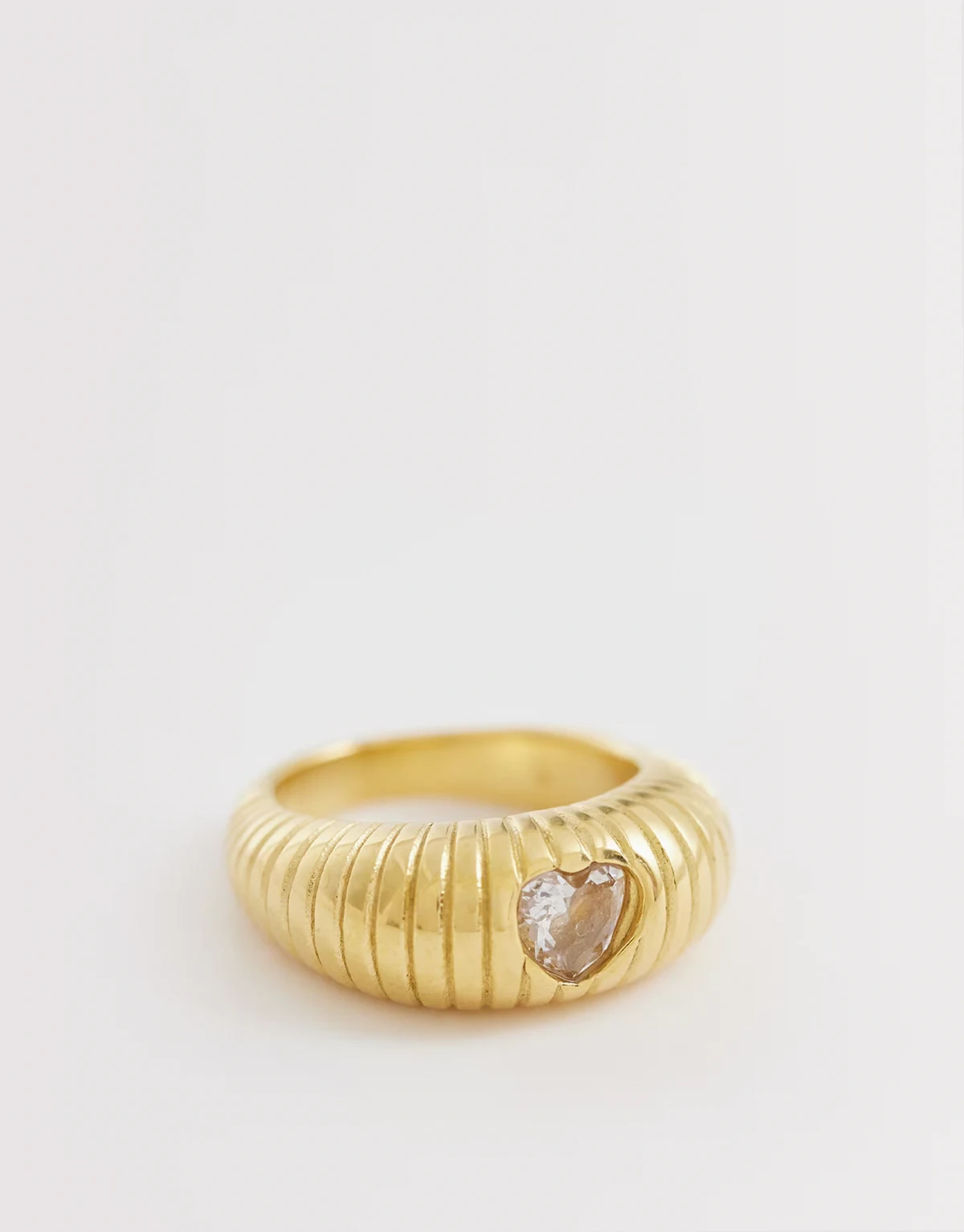 exclusive stainless steel ribbed heart stone ring in gold