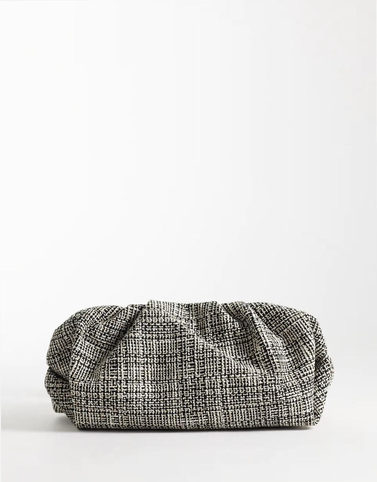 cloud clutch purse in black and white bouclé
