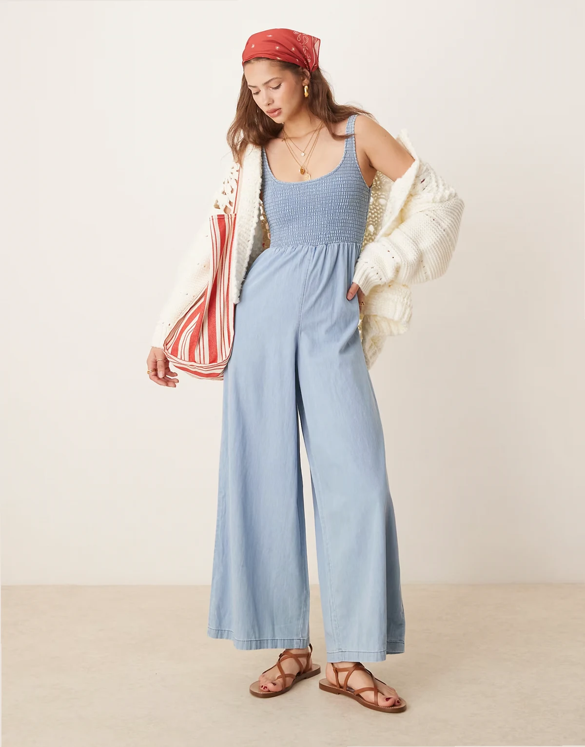 soft denim wide leg jumpsuit with shirred body in light wash