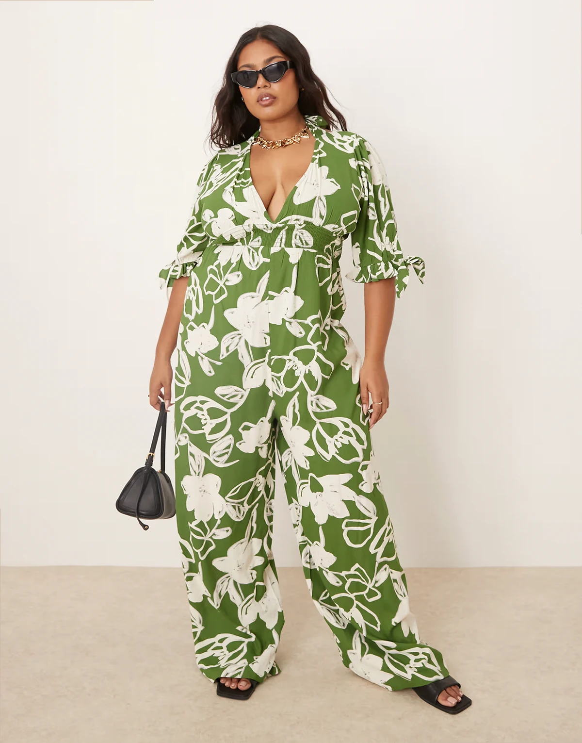 ASOS DESIGN Curve – Zielony kombinezon z marszczoną talią w kwiatowy wzór