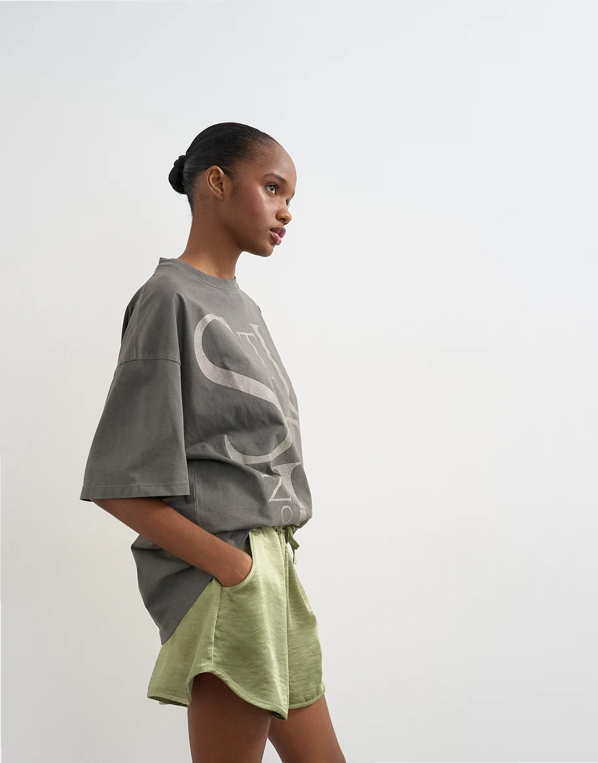 satin running shorts with deep waistband in green