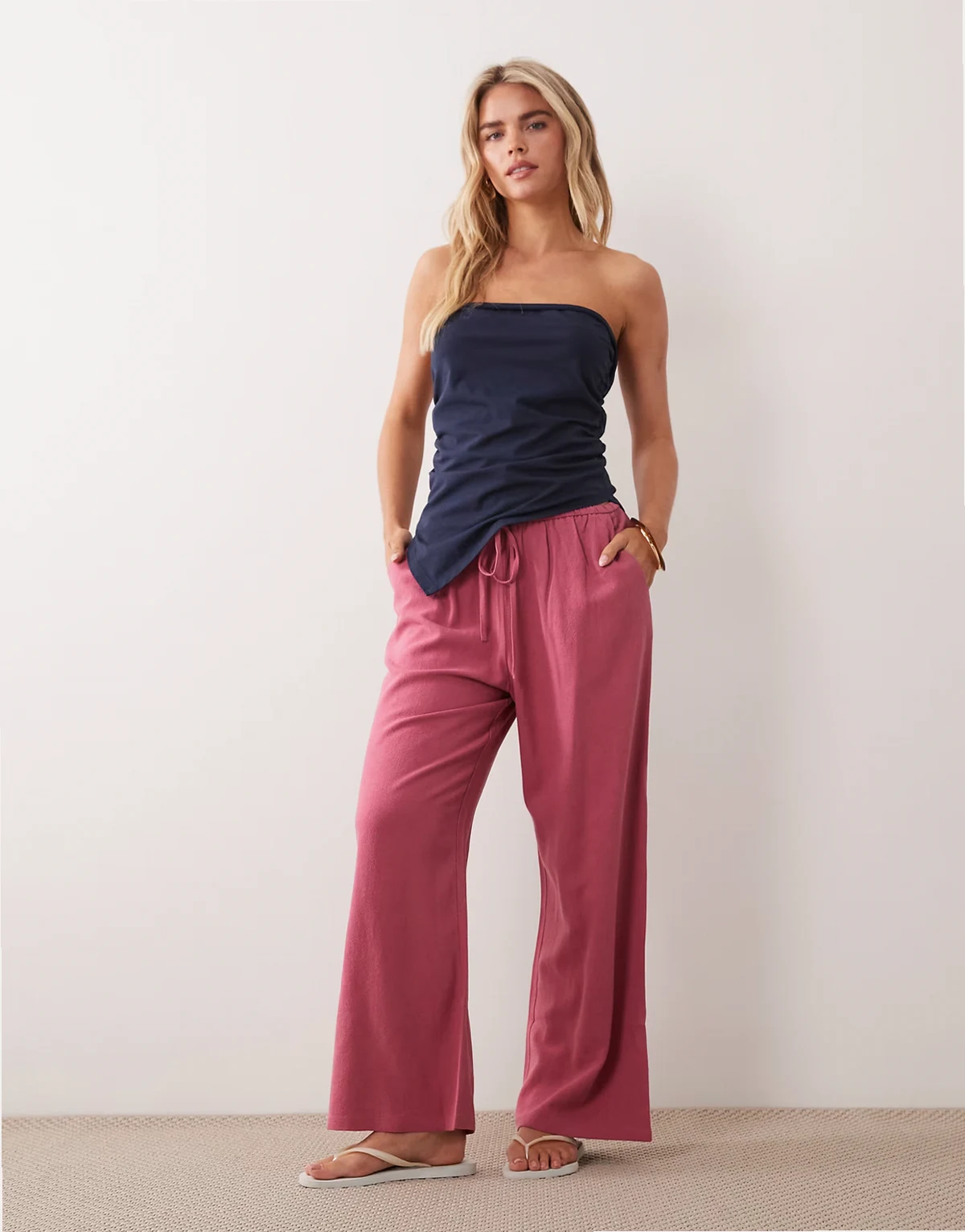 – Schlupfhose in himbeerrosa Leinenoptik