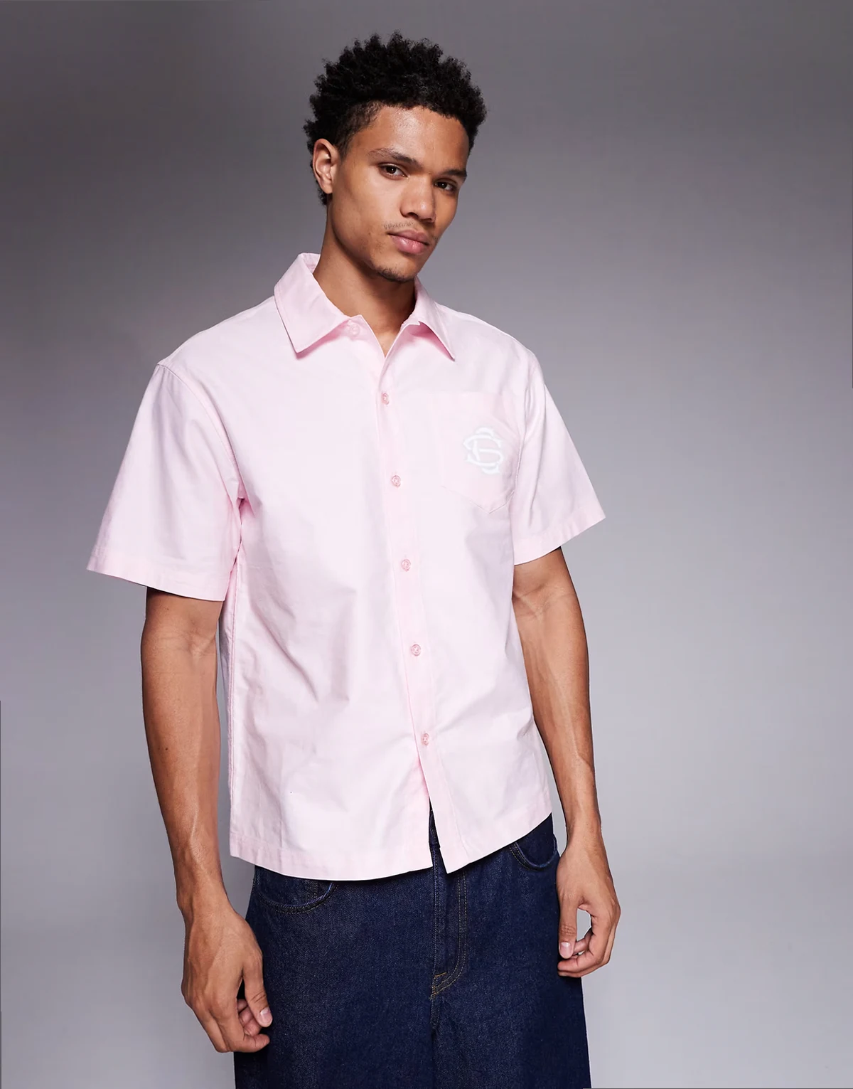 boxy short sleeve shirt in pink with logo print
