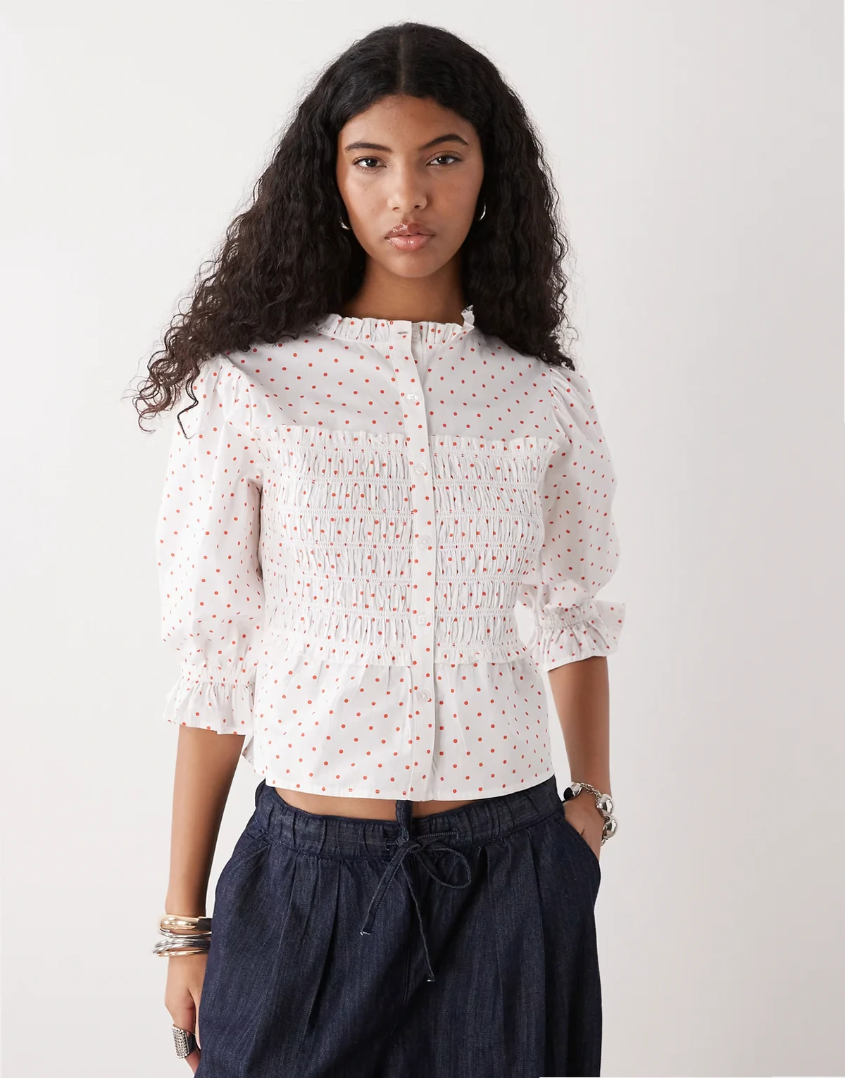 shirred polka dot blouse in white