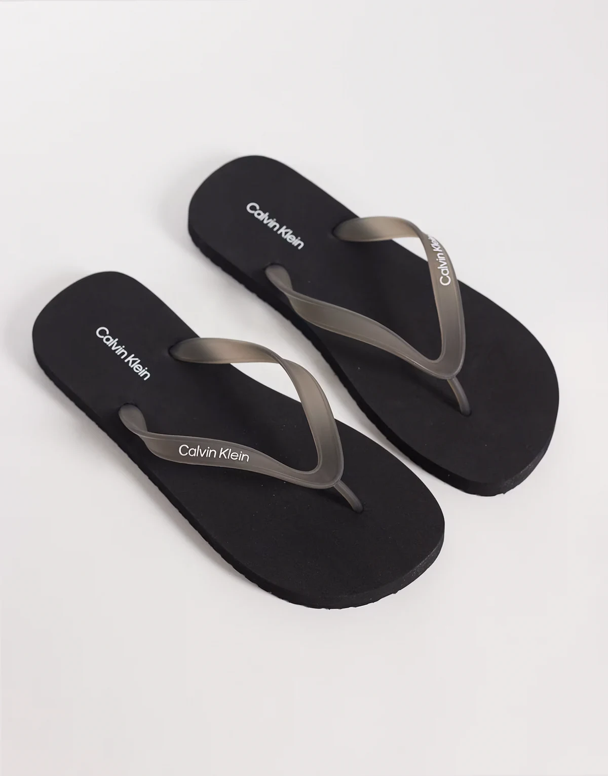 flip flops in transparent black