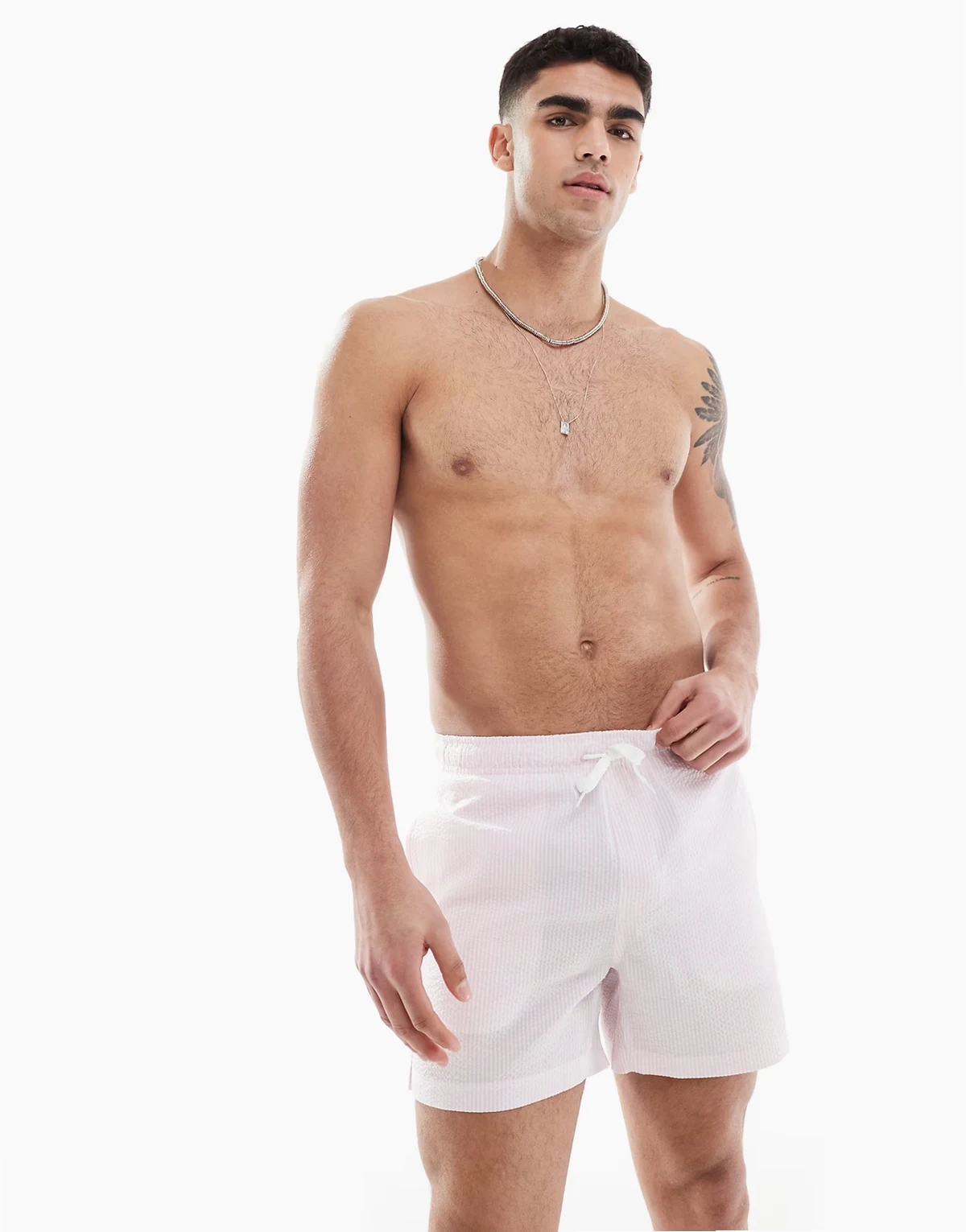 seersucker swim shorts in pale pink stripes