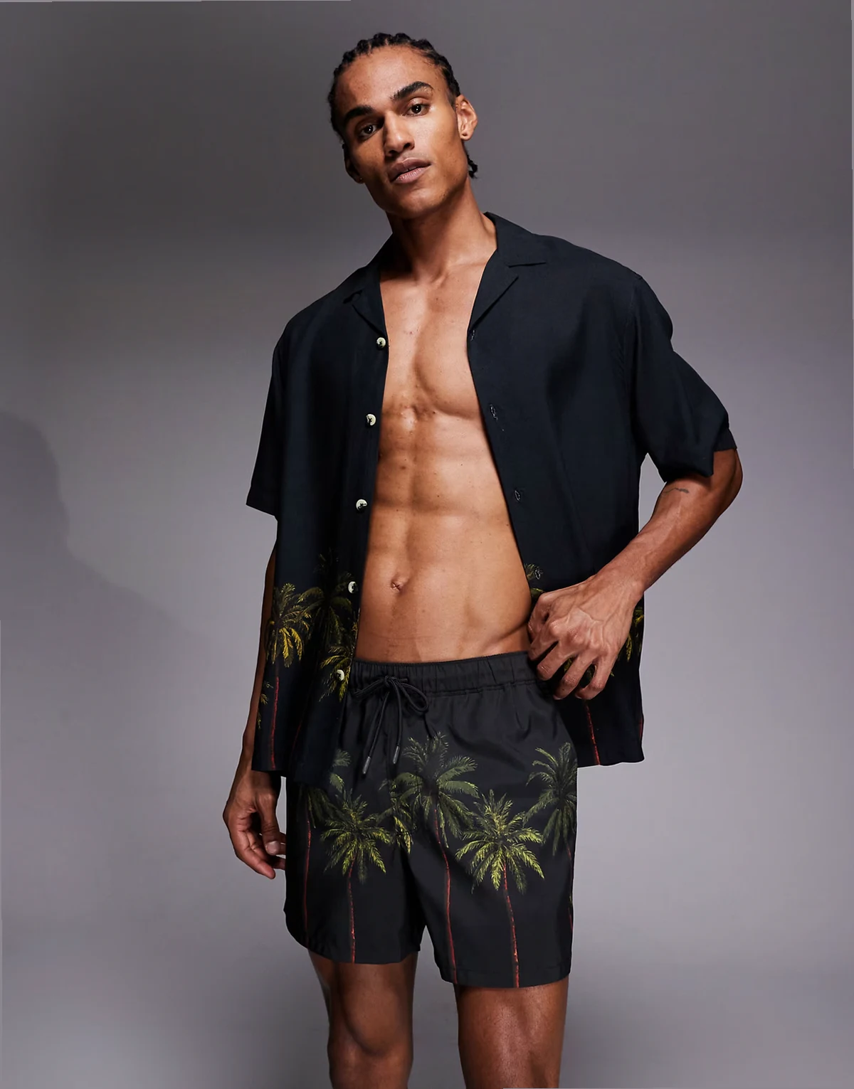 swim shorts in short length with palm tree print in black - part of a set