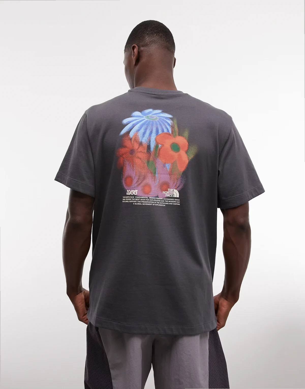 1966 Flora back print T-shirt in washed black